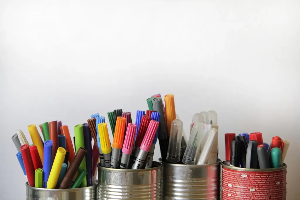 Tins of colourful markers