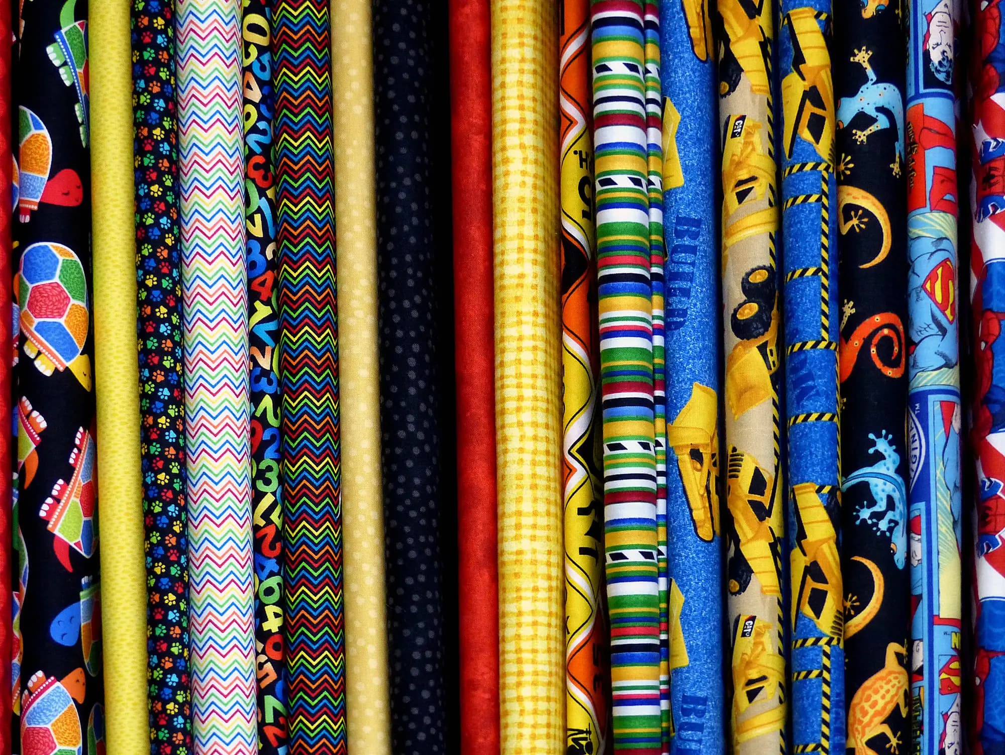 Rolls of printed fabric