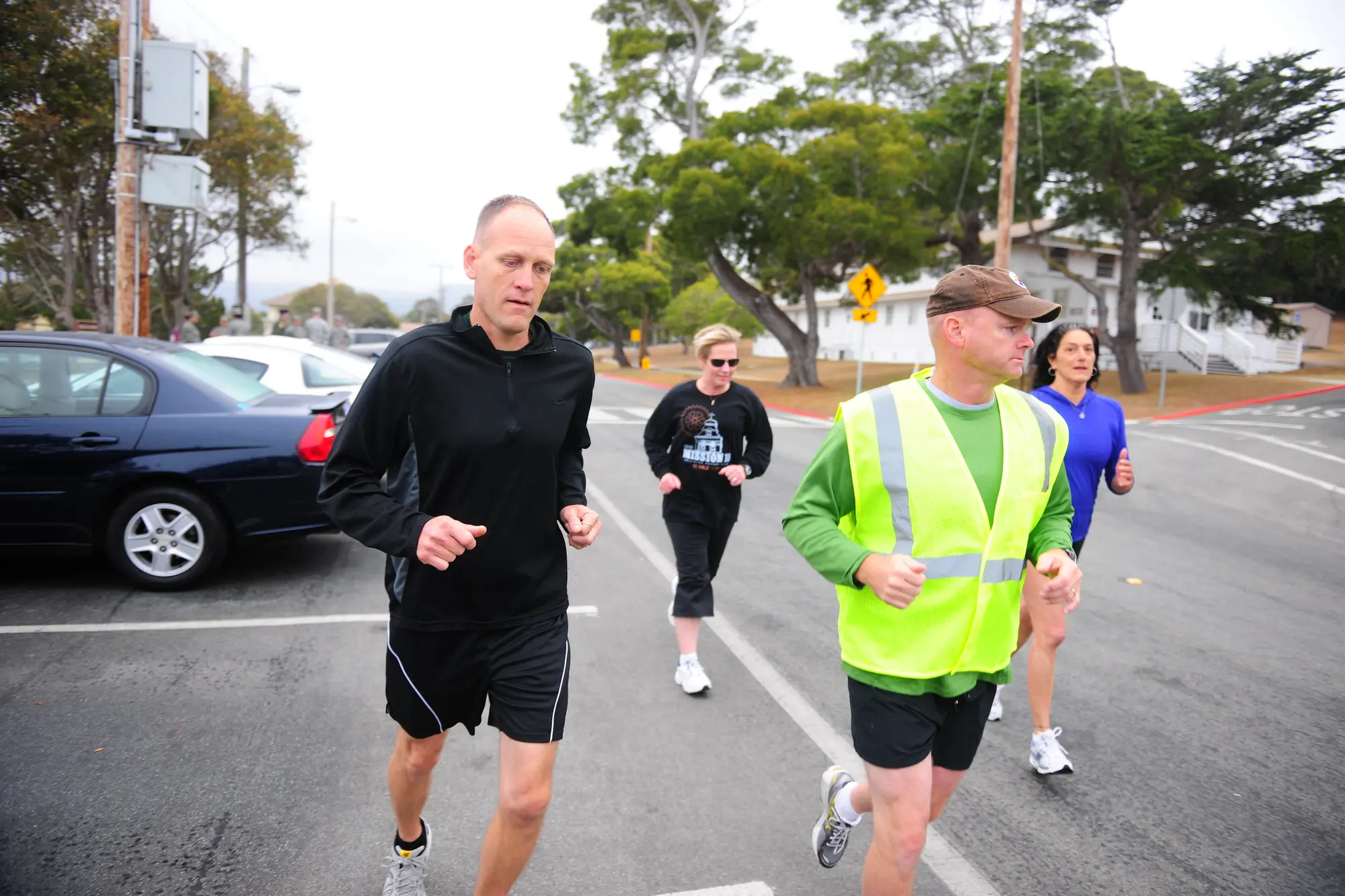 Runner wearing a reflective safety vest